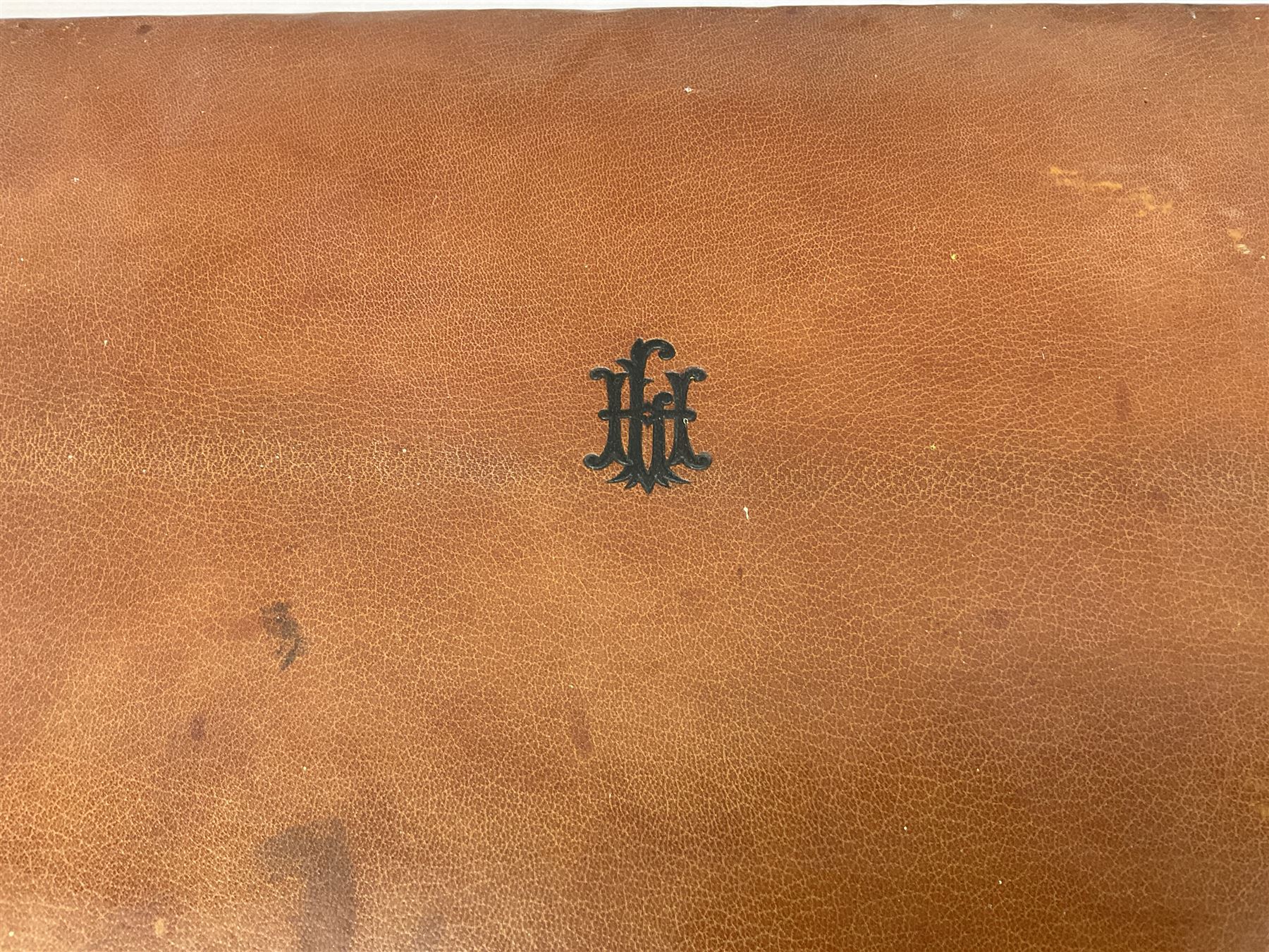 Vintage leather traveling case with monogram to cover, with watered silk lining to interior, and some contents, plus a further vintage travel case, (2)