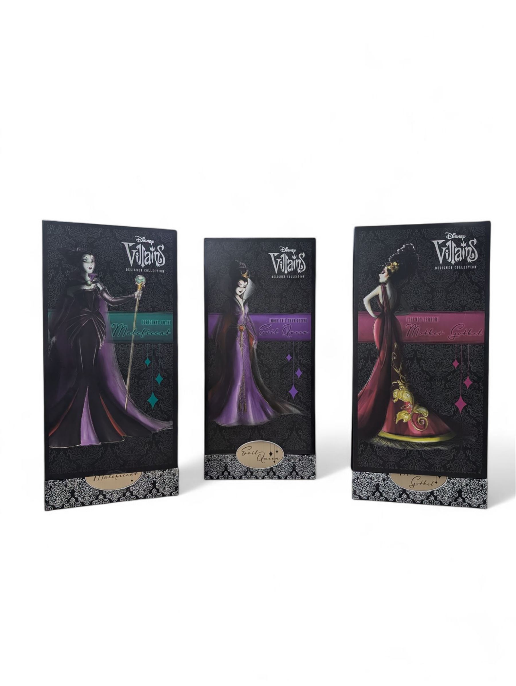 Three Disney Villains Designer Collection dolls,  'Evil Queen', 'Malificent' and Mother Gothel, all in original boxes and bags