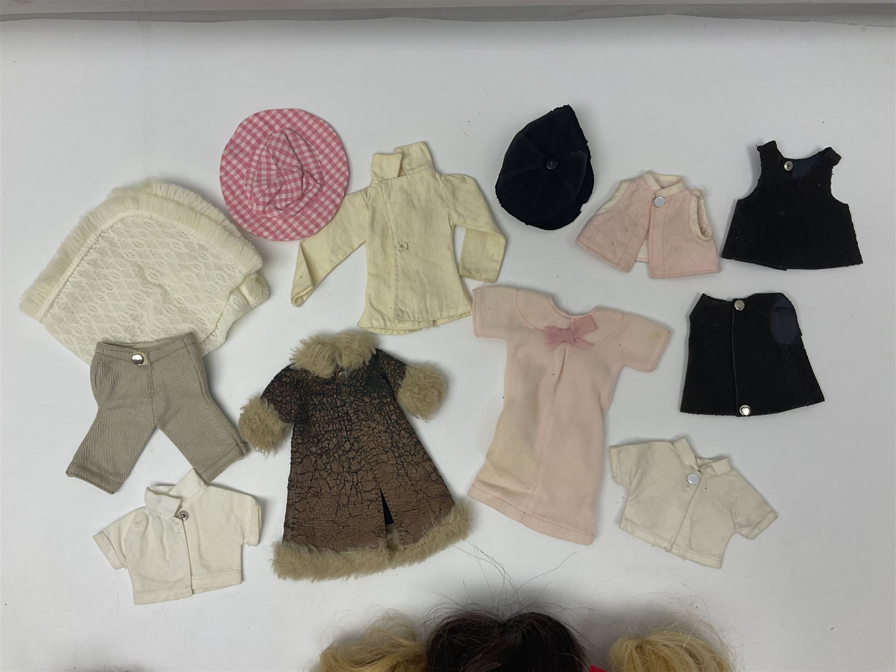 Six fashion dolls by Amanda Jane, Sindy and Barbie with various outfits, clothing and footwear