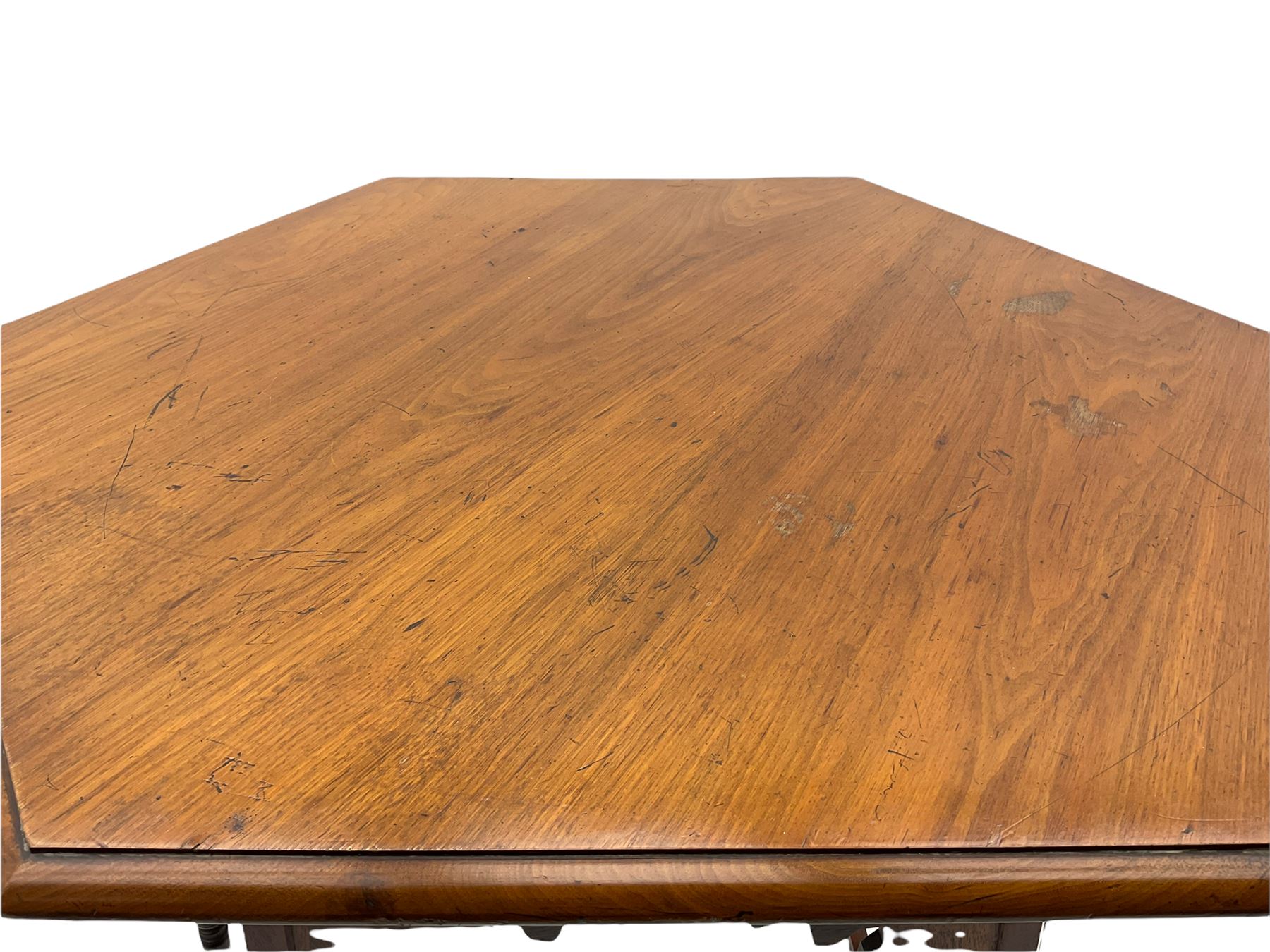 Liberty & Co circa 1890 - walnut centre table, hexagonal form, fretwork frieze, star stretcher base, turned supports on button feet. Stamped on underside.
Featured in - Pictorial Dictionary of British 19th century Furniture Design, Daryl Bennett Liberty's Furniture, 1875-1915, The Birth of Modern Design.
Liberty Style, The Classic Years, 1898 - 1910, by Mervin Levy.