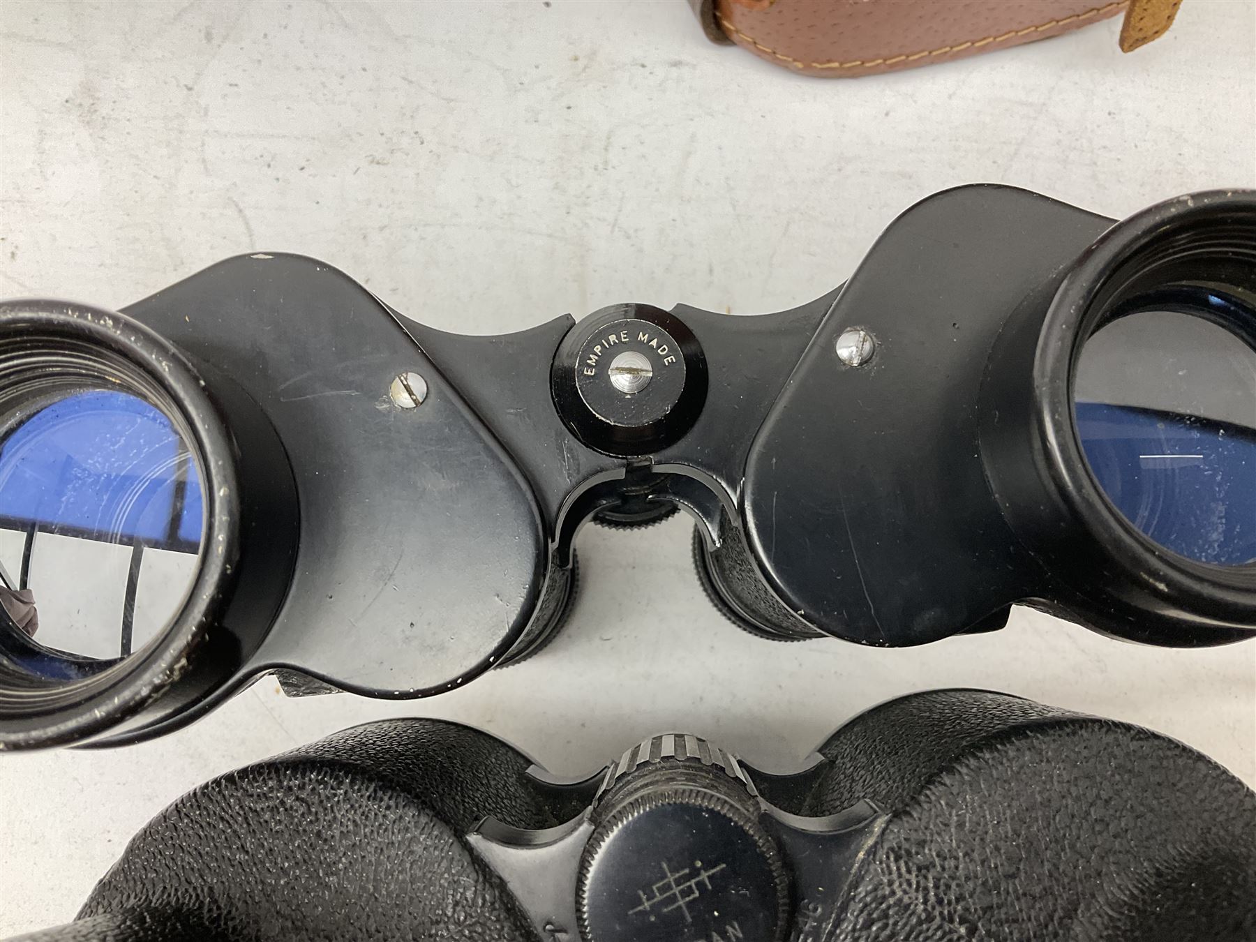 Twelve pairs of binoculars to include BWCF 7x35 Extra Wide Angle, Carl Zeiss Jena Delturis 8x24, Carl Zeiss Jena Jenoptem 8x30W, Chinon Countryman 10x50,  Ajax 8x30, Regent 16x50, etc,  some with cases