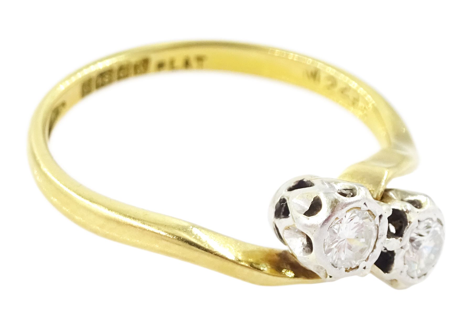 18ct gold diamond crossover ring, set with two round brilliant cut diamonds, Birmingham 1962, total diamond weight approx 0.25 carat