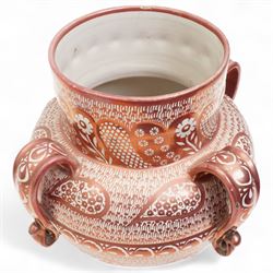 Hispano-Moresque copper four-handled lustre vase, decorated with repeating leaf and foliate patterns, H30cm 