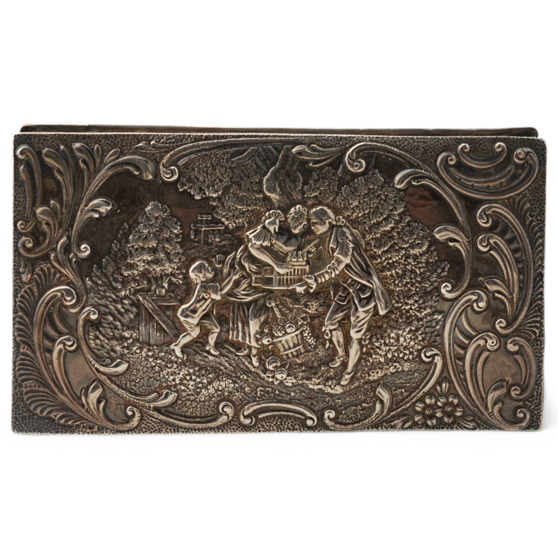 Late Victorian silver rectangular ring box embossed with classical figures, musicians, scrolls etc, and with plush lined divided interior L14.5cm Birmingham 1900 Maker Levi & Salaman