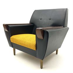 Retro armchair, external timber arms against black buttoned leather upholstery, raised on tapering supports 
