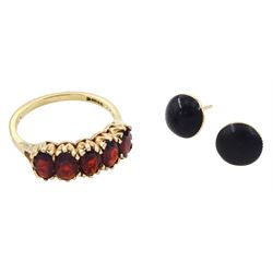 Pair of 9ct gold jet circular stud earrings, with original receipt and a garnet five stone ring, hallmarked 9ct