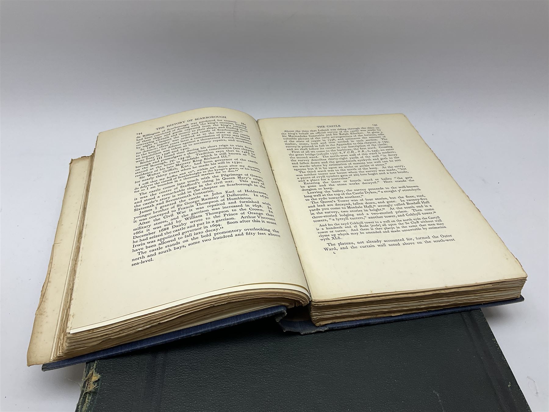 The History of Scarborough, edited by Arthur Rowntree and published by J.M. Dent & Sons Ltd, with an inscription to the title page reading 'Collaborator George Rowntree' together with The Universal Atlas published by Cassell & Company Ltd