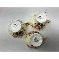 Royal Albert part tea service for four decorated in the 'English Beauty' pattern, comprising four teacups, five saucers, seven sideplates, sandwich plate, jug and sucier, all stamped beneath