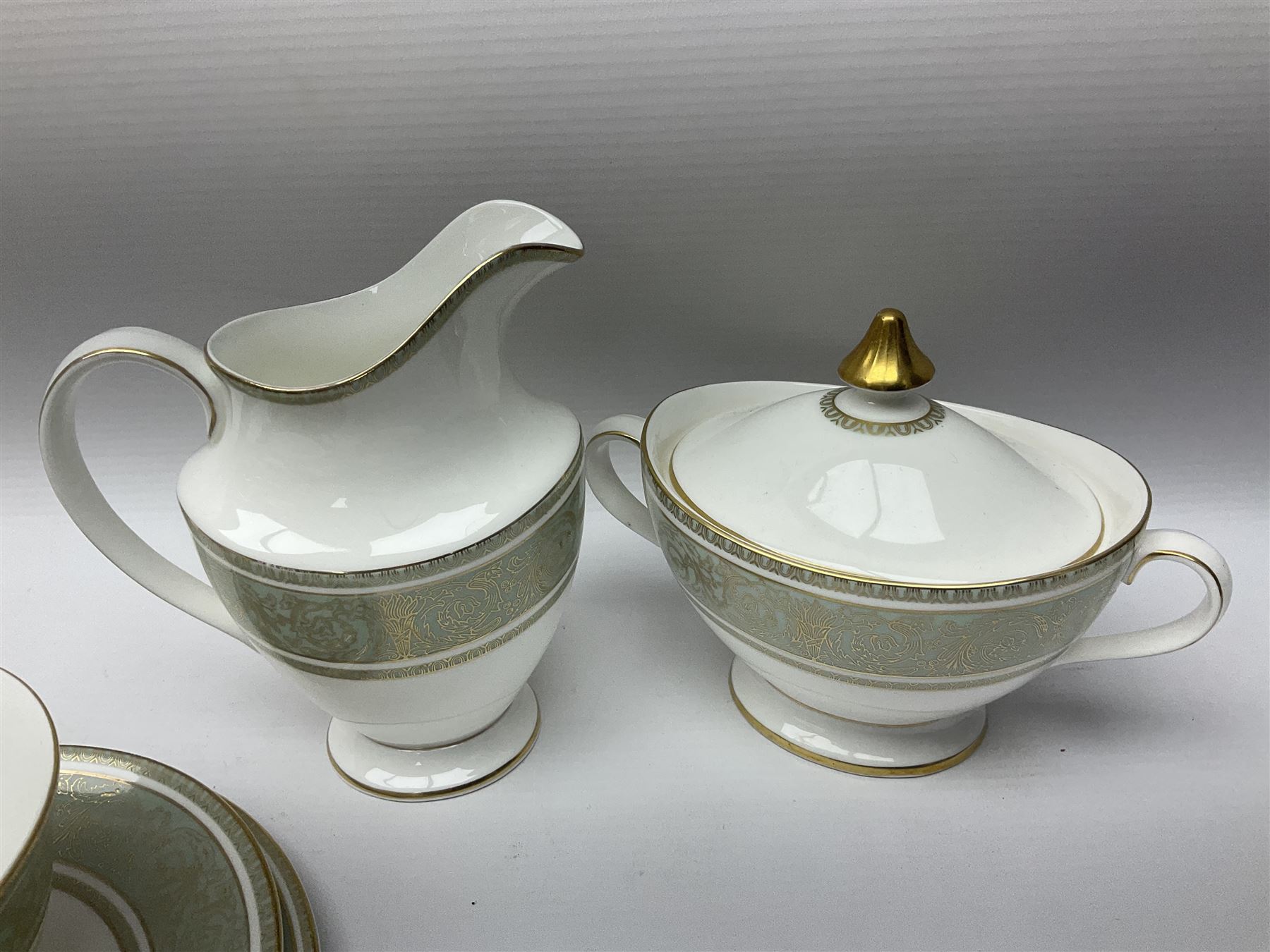 Royal Doulton English Renaissance pattern tea service, comprising teapot, milk jug, open sugar bowl, covered sugar bowl, seven cups, eight saucers and eight side plates (27)