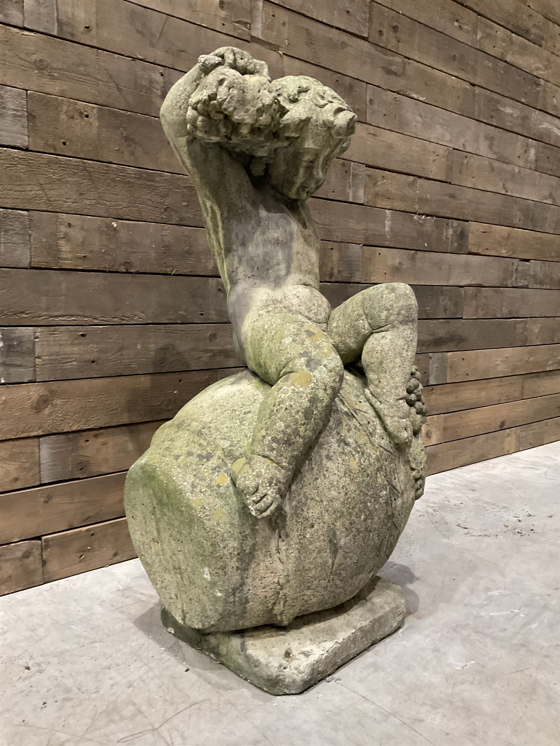 Cast stone garden figure - grape carrier on barrel