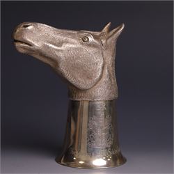 Late 20th century commemorative silver stirrup cup, surmounted by a naturalistically model...