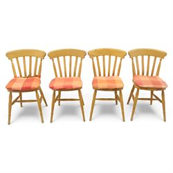 Late 20th century pine farmhouse dining table, rectangular top raised on turned legs, together with a set of matching spindle-back chairs with padded seats