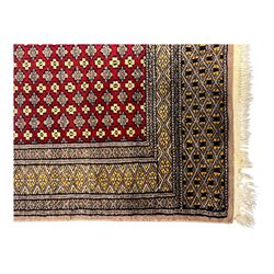 Pakistani Kashan hand-knotted rug with a central medallion and intricate geometric floral patterns, set against a red field and framed by a multi-band border (156 x 94cm); Pakistani Kashan rug with a repeating floral motif across the red field, enclosed by a detailed geometric border in complementary tones (162 x 95cm)