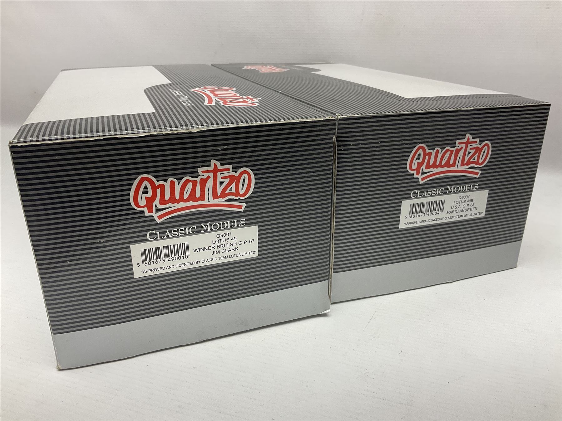 Four Quartzo/A-Model 1:18 scale die-cast racing cars - Lotus 72D 'JPS' Winner British G.P. 72 Emerson Fittipaldi; Lotus 49 Winner British G.P. 67 Jim Clark; Lotus 49B U.S.A. G.P. 68 Mario Andretti; and Lotus 49B Winner Monaco G.P. 68 Graham Hill; all boxed (4)