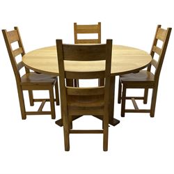 Circular oak dining table, on square supports united by x-frame floor stretchers (D150cm, H77cm); together with a set of four oak dining chairs