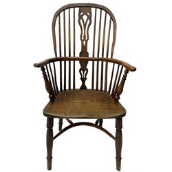 19th century yew wood and elm Windsor chair, high hoop and stick back with pierced splat over dished seat, raised on ring turned supports united by crinoline stretcher