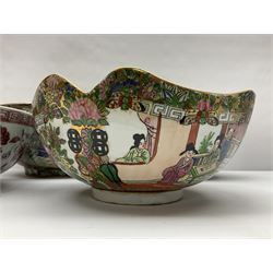 Three Chinese Famille Rose bowls, decorated in polychrome enamels with panels of birds amongst peonies and figural scenes, together with another bowl