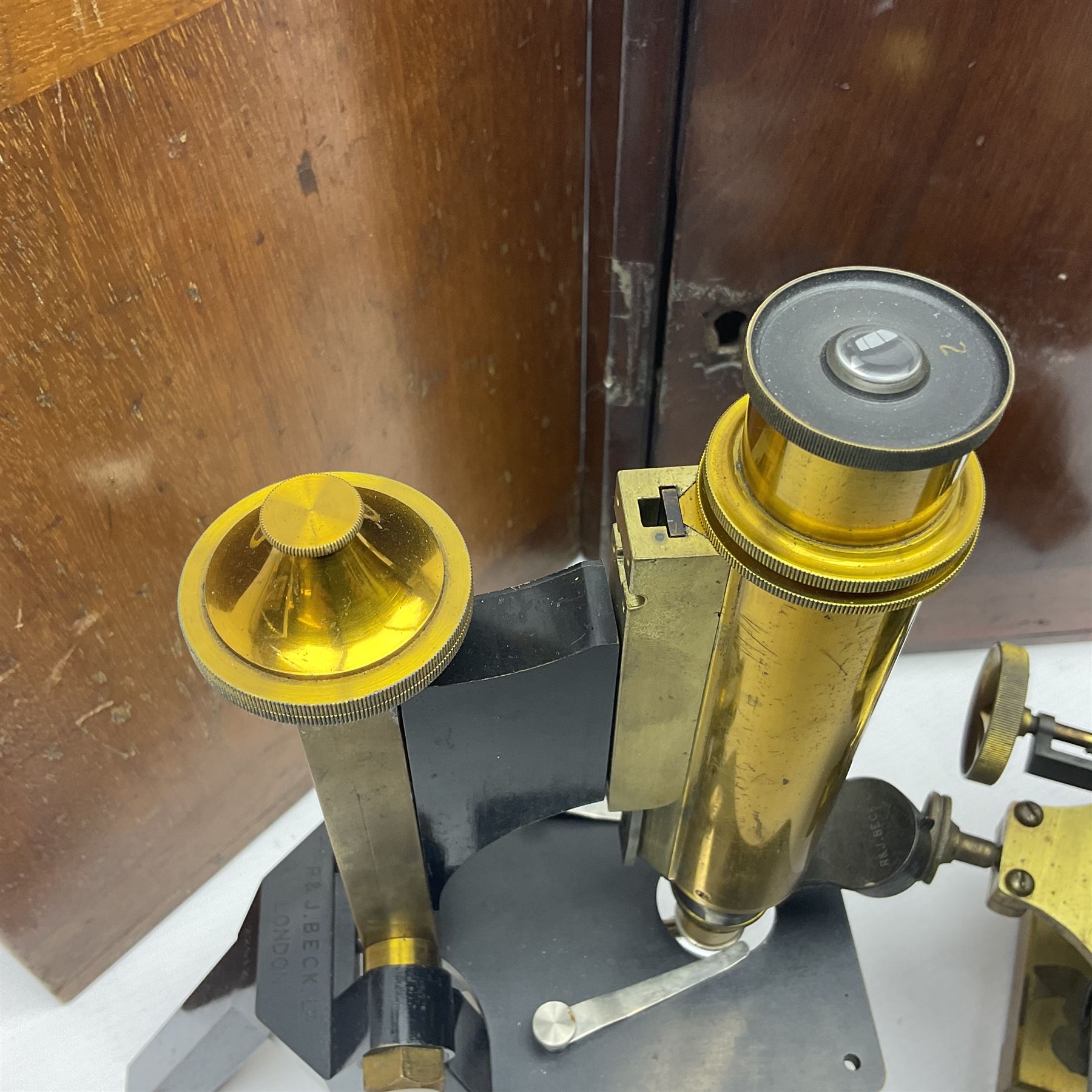 Two R & J Beck microscopes, no 22512 and no 25117, both in original wooden boxes 