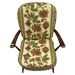 Ercol - Pair of mid-20th centur medium elm framed easy chairs, with loose patterned covers with folate design