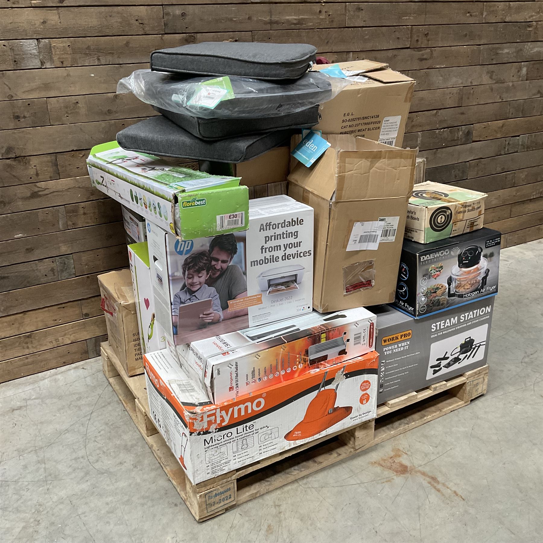 Collection of boxed items including a Flymo Micro Lite lawn mower, HP printer, Daewoo Halogen Air Fryer, an oil filled radiator etc