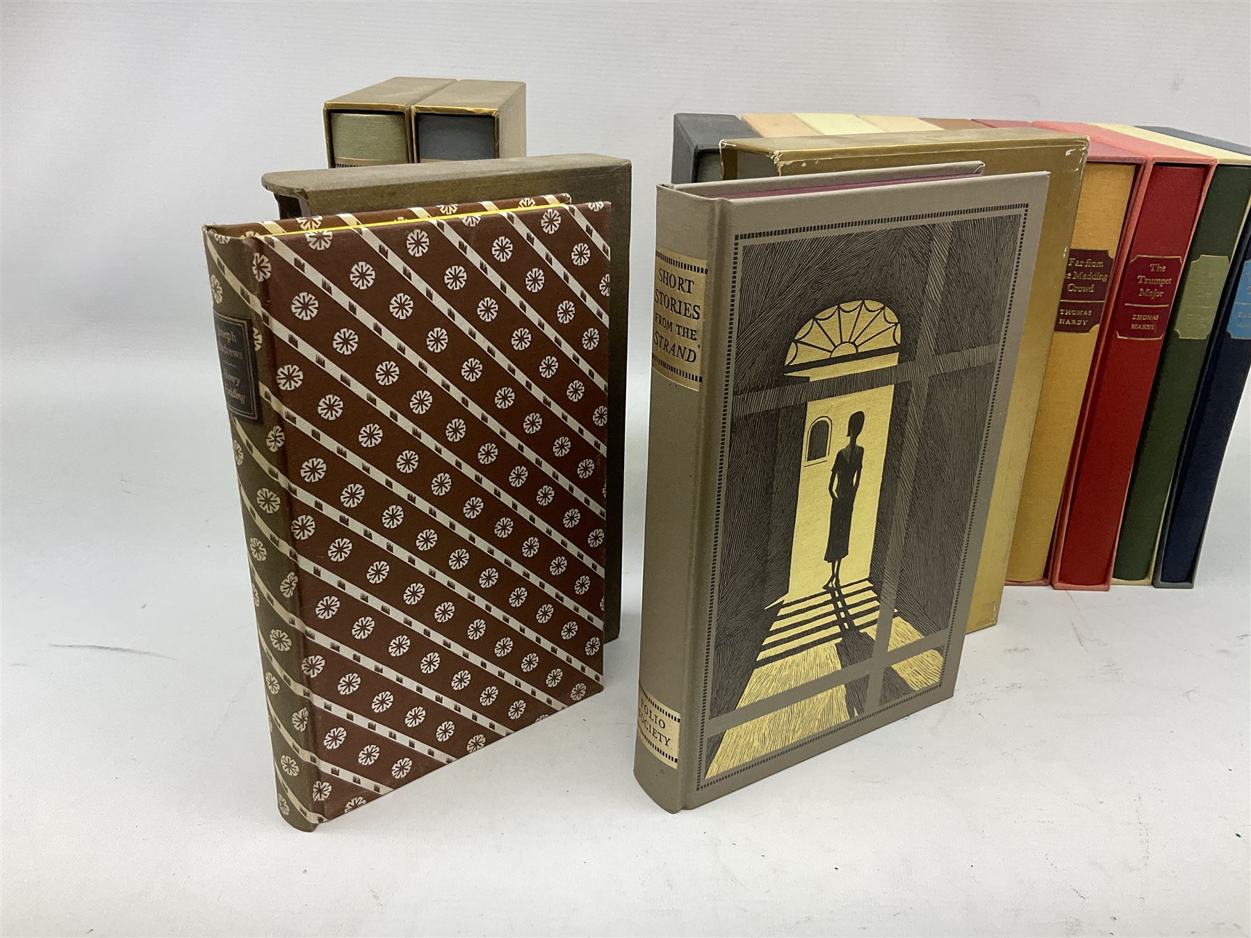Folio Society; twelve volumes, comprising Hemingway; Short Stories, Henry Fielding; Joseph Andrew, Baroness Orczy; The Scarlet Pimpernel and nine volumes by Thomas Hardy (12)
