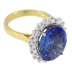 18ct gold oval unheated sapphire and round brilliant cut diamond cluster ring, hallmarked, sapphire 7.46 carat, with certificate