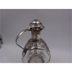 20th century Mexican silver overlaid Dimple whisky decanter/jug with stopper, the glass body overlaid with pierced floral silver decoration, with silver C handle and silver stopper, stamped 925 to base, H23.5cm