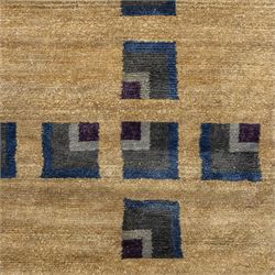 Rugs by Design - ‘Silk Stone’ Nepalese thick pile wool rug, with plain textured camel ground and geometric border detail in blue, grey and dark tones to two sides