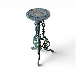 19th century ornate cast iron high garden drinks table, small circular pierced top, raised on three legged base
