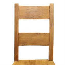 Indigo Furniture - large rustic oak dining table, rectangular four plank top raised on square supports; with set of six beech high ladder-back dining chairs