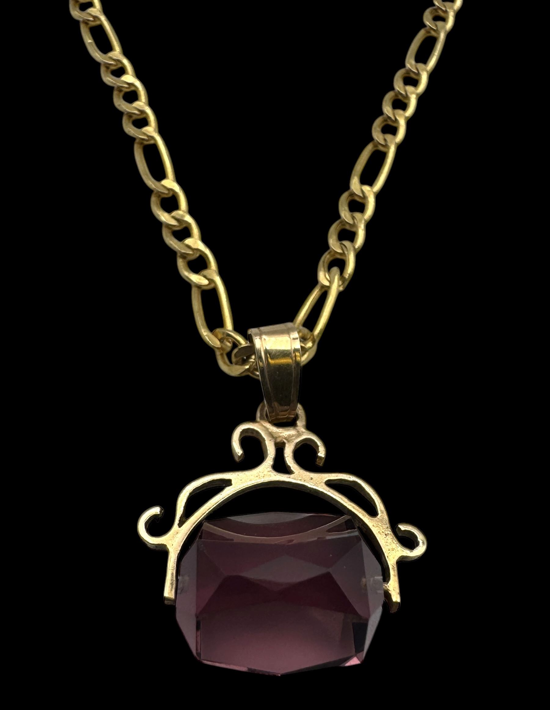 9ct gold amethyst glass spinner pendant, on 9ct gold chain necklace, both hallmarked