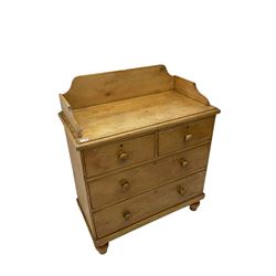 Victorian pine wash chest, raised shaped back, fitted with two short and two long drawers