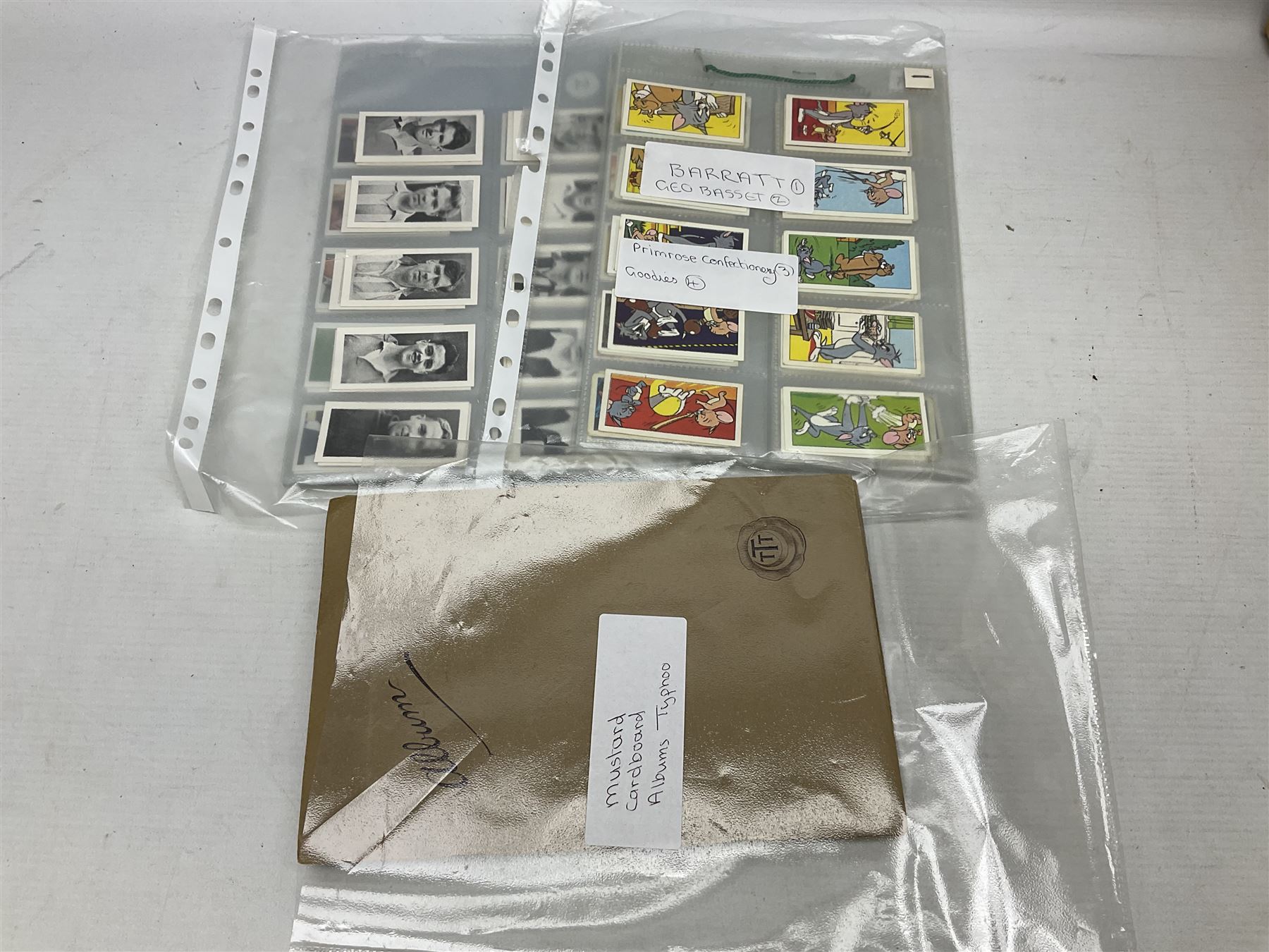 Quantity of trade cards, housed in ring binder albums and loose, including Twinnings, Lyons, PG Tips, Hornimans, Ty-Phoo etc and various unused official paper albums, in two boxes
