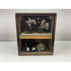 Early 20th century valve crystal radio, bearing plaque to interior reading 'Supplied by Selfridge & Co Ltd, set number 10231', in predominantly walnut case, H40cm W35cm