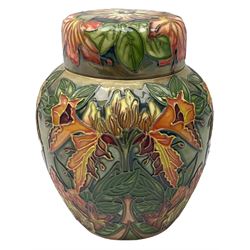 Moorcroft ginger jar, decorated in the Flame of the Forest pattern designed by Philip Gibson, with impressed and painted marks beneath, including date symbol for 1999, H15.5cm. 