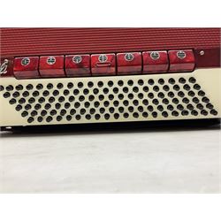 Clinkscale Crucianelli piano accordion in red pearline case with one-hundred and twenty buttons and forty-one keys L52cm; in carrying case