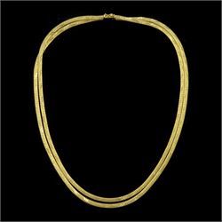 18ct gold three strand flattened link necklace, stamped 750