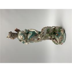 Mid 18th century Derby porcelain figure modelled as Dianna the Huntress, with quiver of arrows upon her back and dog by her side, upon a naturalistically modelled base, with patch marks beneath and collectors labels, H26cm