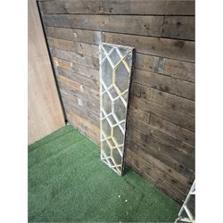 Four 19th century cast iron windows, lattice glazed in white painted finish, 