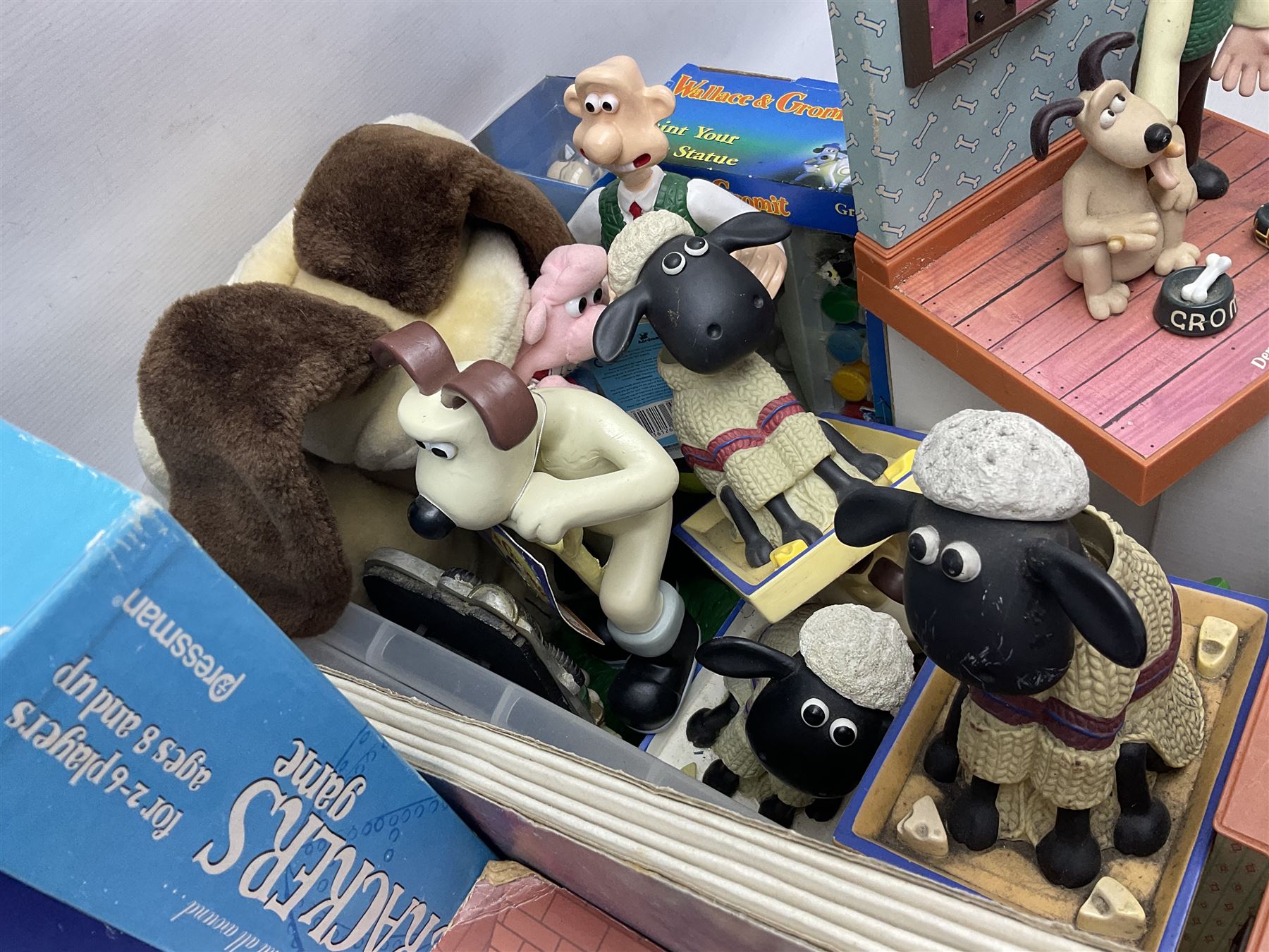 Large collection of Wallace & Gromit collectables, including four Born to Play  figures, clocks, composite figures, etc, in four boxes   