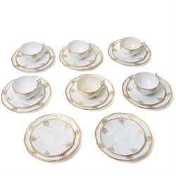 Early 20th century Sarreguemines tea wares, decorated with peacock feathers in gilt, compr...