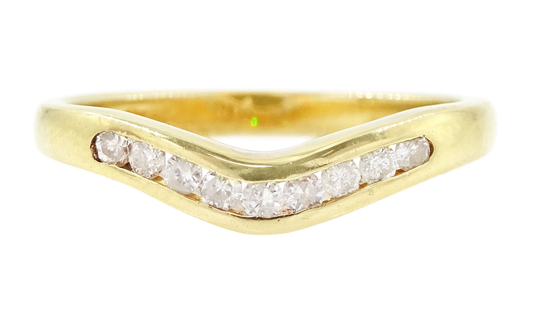 18ct gold diamond wishbone ring, channel set with nine round brilliant cut diamonds, Birmingham 1994, total diamond weight 0.15 carat