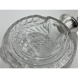 Modern silver mounted glass decanter, the cut glass body of circular form, with personal engraving, the silver collar hallmarked L J Millington, Birmingham 2008, overall H23.5cm