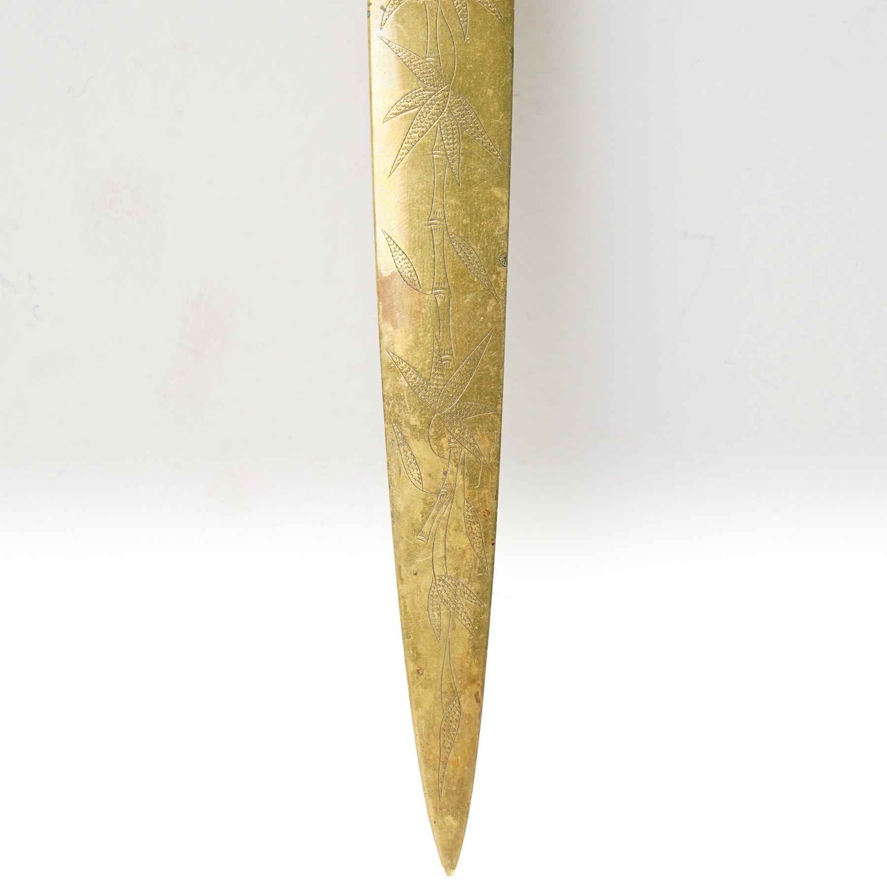 Chinese 18th/ 19th century jade pendant, carved as a peach on a branch, later mounted as a brass paper knife, with bamboo engraved decoration, H20cm
