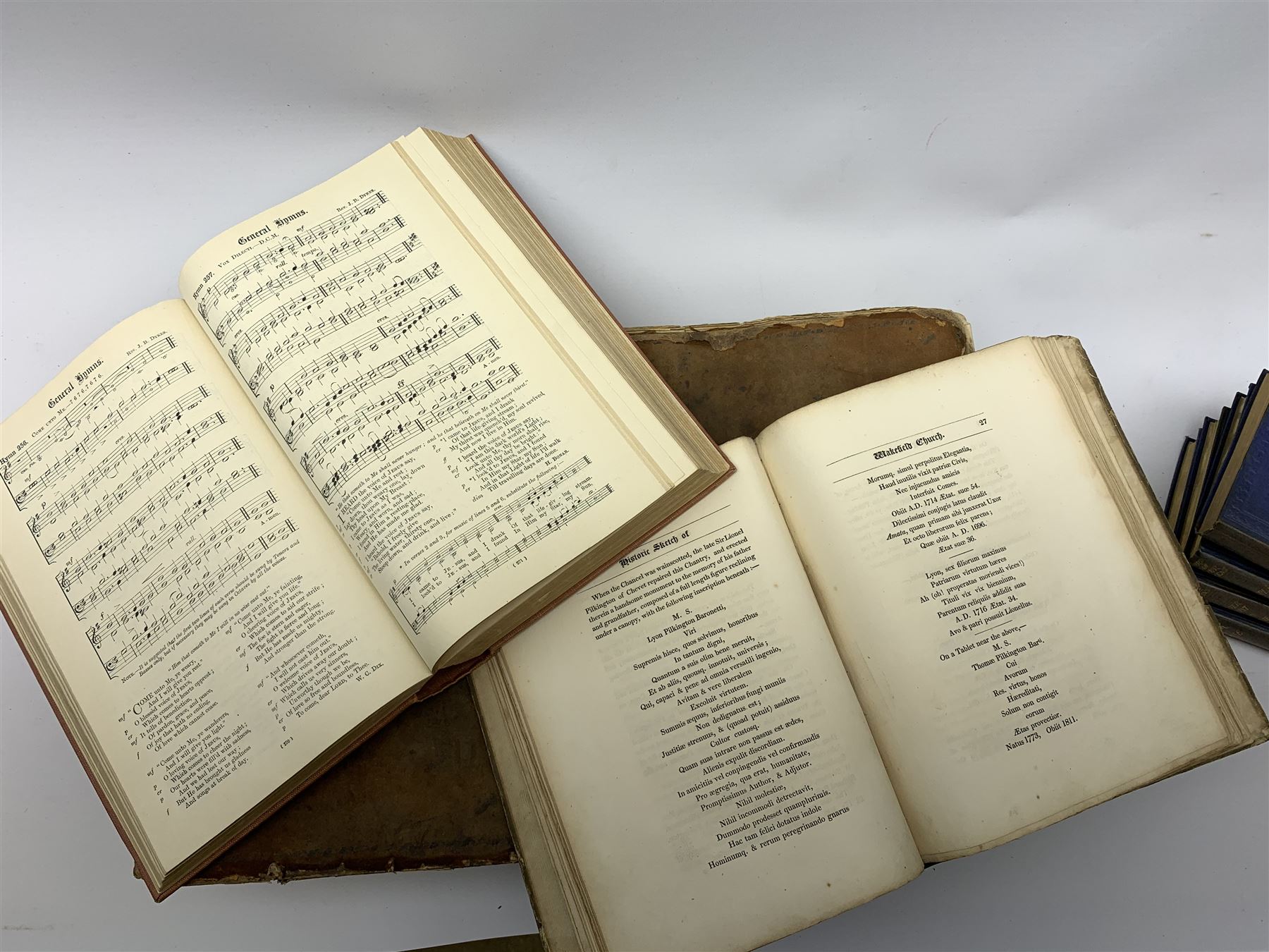 The Holy Bible containing the Old and New Testaments. 1816. Engraved title page and plates. Large folio. Full suede leather binding; Complete Works of Charles Dickens. Oxford India Paper Edition. Seventeen uniformly bound volumes illustrated by Cruikshank, Phiz etc; Sisson Rev. J.L.: Historic Sketch of the Parish Church, Wakefield. 1824; and other books