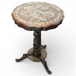 Chinese hardwood tripod occasional table, the scalloped circular top extensively inlaid wi...