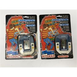 Collection of retro handheld games, including Nintendo Game & Watch ‘Snoopy Tennis’ (1982) and ‘Squish’ (1986) both with instruction booklets, Casio CG-600 ‘Star Invader’ with box, 3 in 1 LCD cartridge game including ‘Soccer’, ‘Invader’ and ‘Bomb Finder’ games, and two Grandstand ‘Pinball Wizard’ (1988) games, both with original boxes