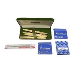 1970s gold plated Waterman C/F fountain pen, nib stamped 18k 750, together with two matching ballpoint pens and a propelling pencil, with green velvet Waterman case and ink