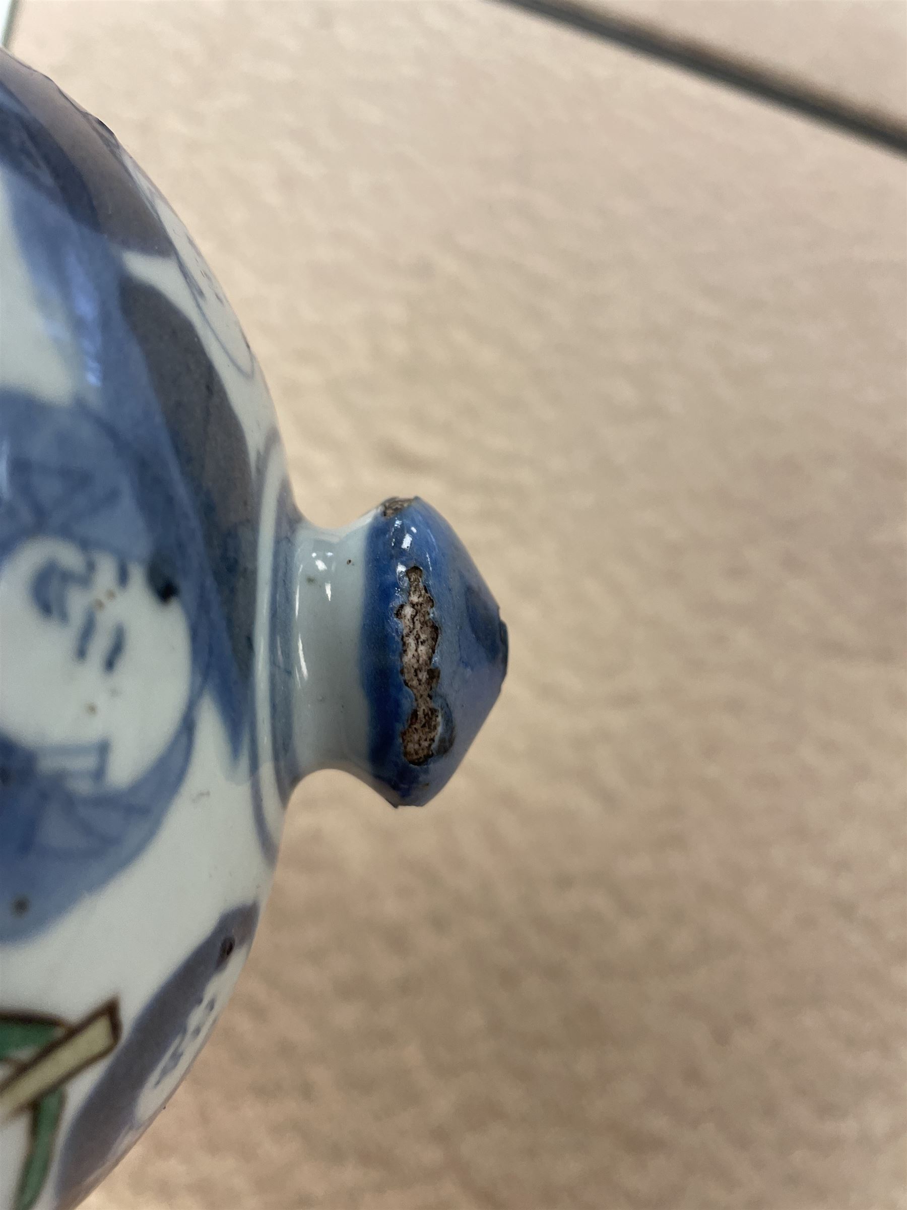 17th century Transitional period Chinese Wucai vase and cover, of baluster form, the body painted with ladies upon a terrace, and figures upon horseback and attendants within a fenced garden, the domed cover with knop finial painted with boys at play, H37cm
