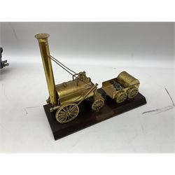 Modern Kovap Czechoslovakia tin-plate model of a steam roller; boxed; tin-plate model of a Traction engine and similar model of Stephenson's Rocket with tender; and a brassed stationary model of Stephenson's Rocket on wooden base (4)
